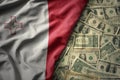 colorful waving national flag of malta on a american dollar money background. finance concept Royalty Free Stock Photo