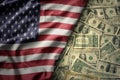 colorful waving national flag of united states of america on a american dollar money background. finance concept Royalty Free Stock Photo