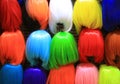 Colorful wig accessories. Sales at the market. Different wigs for women Royalty Free Stock Photo