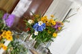 Colorful wild flower bouquet decoration for wedding celebration indoors Royalty Free Stock Photo