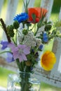 Little wild flower bouquet on a garden bench Royalty Free Stock Photo