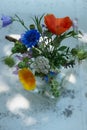 Little wild flower bouquet on a garden bench Royalty Free Stock Photo