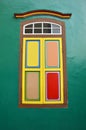 Colorful window a colonial house Royalty Free Stock Photo