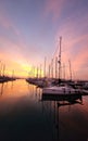 Colorful winter sunset with boats in Pula port in Croatia