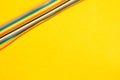 Colorful wires isolated on yellow background. connection wire for electrical schemes. copy space Royalty Free Stock Photo
