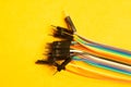 Colorful wires isolated on yellow background. connection wire for electrical schemes. copy space Royalty Free Stock Photo