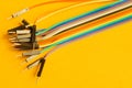 Colorful wires isolated on yellow background. connection wire for electrical schemes. copy space Royalty Free Stock Photo
