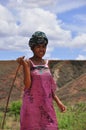 Colorful women with stick in Madagascar