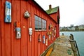 Colorful wood buoys hang on shack Royalty Free Stock Photo