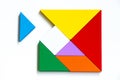 Colorful wood tangram puzzle in square shape that wait to complete Royalty Free Stock Photo