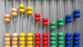 Colorful Wooden Abacus Beads in Sine Wave Pattern Royalty Free Stock Photo