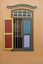 Colorful wooden abstract window, close up . Colonial style architecture building in Little India , Singapore city