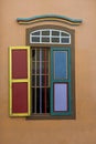 Colorful wooden abstract window, closeup . Colonial style architecture building in Little India , Singapore . Background and