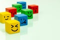 Colorful wooden blocks with emoticons Positive emotions, smiles, facial expressions, Concept of positive thinking and expressing Royalty Free Stock Photo