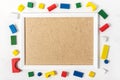 Colorful wooden blocks frame on white background, top view with copy space Royalty Free Stock Photo