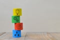 Colorful wooden blocks with targeted business icons and the concept of success Royalty Free Stock Photo