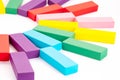 Colorful wooden blocks toys on white background. Creative, diverse, expanding, rising or growing