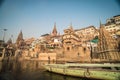 Colorful wooden boats docked along the shore of the Ganges River, at one of the many ghats in Varanasi, India. Royalty Free Stock Photo