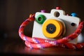 Colorful Wooden Camera Toy on Putted Table Royalty Free Stock Photo