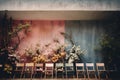 Colorful wooden chairs on the board contrast with the background of colorful flowers and trees Royalty Free Stock Photo