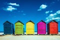 Colorful wooden changing huts on a beach, with nice background of clear blue sky on the coast