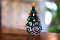 Colorful wooden Christmas tree on the table in the morning atmosphere Royalty Free Stock Photo