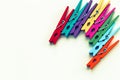 Colorful wooden clothespins on white background with copy space/diversity concept Royalty Free Stock Photo