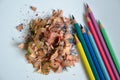 Colored pencils and shavings on white background Royalty Free Stock Photo