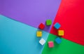 Colorful cubes on a vibrant multicolored background for a creative project Royalty Free Stock Photo