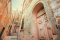 Colorful wooden doors of the old stone houses. Narrow street of historical city, Malta Royalty Free Stock Photo