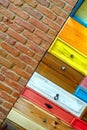 Colorful Wooden Drawer and Brick Wall Royalty Free Stock Photo