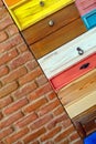 Colorful Wooden Drawer and Brick Wall Royalty Free Stock Photo