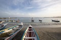 Colorful wooden fisher boats aligned on the beach