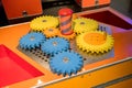 Colorful wooden gears with twisting bar for kid activity and lea Royalty Free Stock Photo