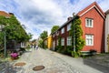 Colorful wooden houses in the old part of Trondheim with picturesque cobbled streets, Norway Royalty Free Stock Photo