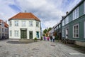 Colorful wooden houses in the old part of Trondheim with picturesque cobbled streets, Norway Royalty Free Stock Photo