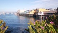 Wooden houses on piles, ocean bay harbor. Old Fisherman's Wharf. Monterey Marina