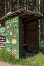 Colorful wooden hut as a bus stop Royalty Free Stock Photo