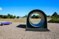 Colorful wooden Kids playground tunnel. Levin, New Zealand