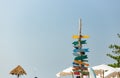 Colorful wooden road signs on the beach. Direction board on the beach Royalty Free Stock Photo