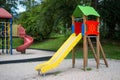 A colorful wooden slide in the park in the children\'s playground