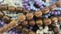 Colorful wooden and stone rosaries Royalty Free Stock Photo