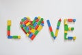 Colorful wooden toy blocks as heart in LOVE Royalty Free Stock Photo