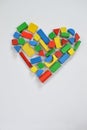 Colorful wooden toy blocks as heart Royalty Free Stock Photo