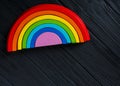 Colorful wooden toy rainbow, arc rainbow for children, toys for creativity  development. Children`s waldorf or montessori school Royalty Free Stock Photo