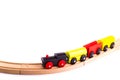 Colorful wooden toy train on a wood rail Royalty Free Stock Photo