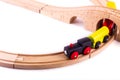 Colorful wooden toy train on a wood rail Royalty Free Stock Photo