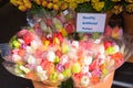 Colourful wooden tulips for sale at the flower market in Amsterdam