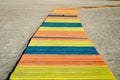 Colorful wooden walkway  to the beach Royalty Free Stock Photo