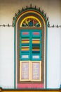 Colorful wooden window exterior Colonial style architecture building or home and living in Little India, Singapore